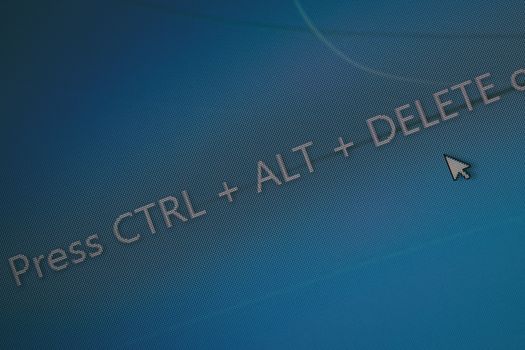 display with word "press Ctrl + Alt + Del" on display for operating system startup