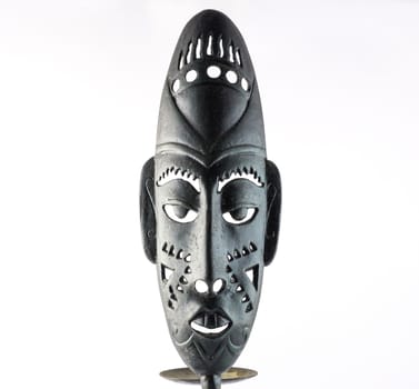 African mask isolated on a white background.
