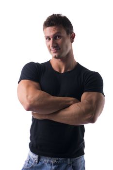 Confident and happy muscular young man with arms crossed on his chest, isolated on white