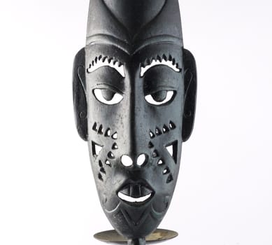 African mask isolated on a white background.