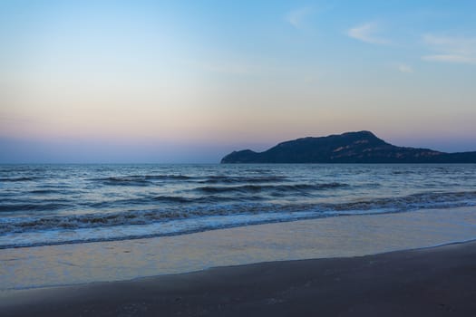 landscape with sea and mountain at sand beach