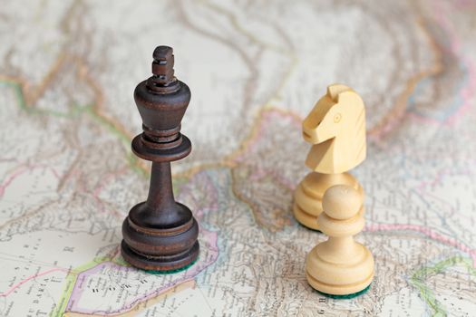 Chess figures on a historical map