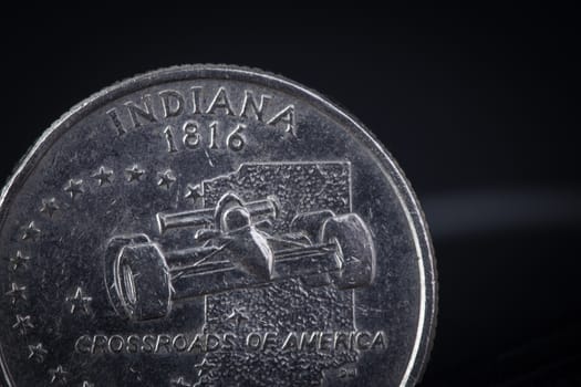 US American coin with wording "crossroads of america" on black background