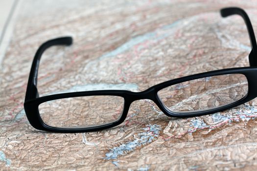 Glasses on a historical map