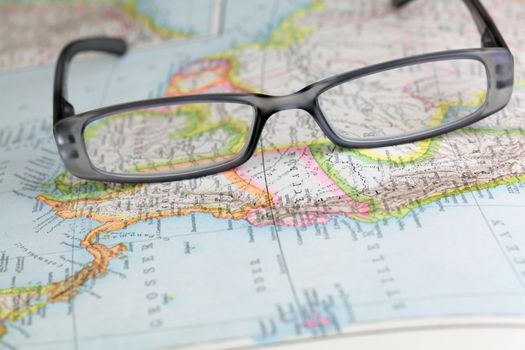 Glasses on a historical map