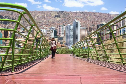 LA PAZ, BOLIVIA - OCTOBER 14, 2014: The pedestrian Via Balcon (Balcony Path) (about 3 kms long) over the Parque Urbano Central (Central Urban Park) built to enjoy the view of the city photographed on October 14, 2014 in La Paz, Bolivia  
