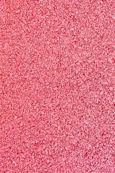 background texture of rough red asphalt