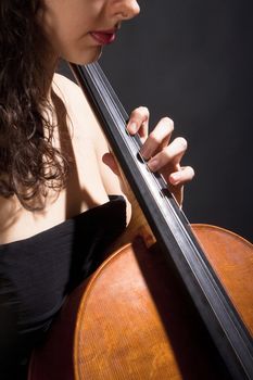 Closeup of a Female Musician Playing Violoncello