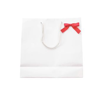 white shopping bag and bow isolated on white background