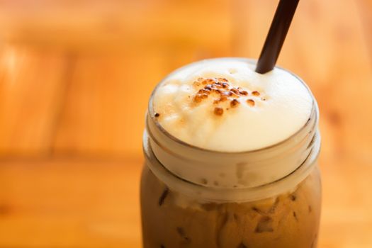 Iced caffe mocha with milk foam, stock photo