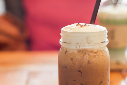 Iced caffe mocha with milk foam, stock photo