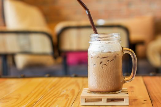 Iced caffe mocha with milk foam, stock photo