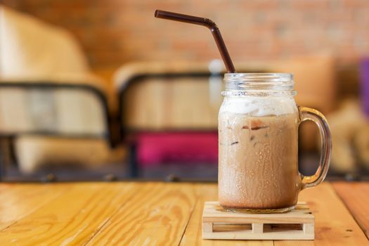 Iced caffe mocha with milk foam, stock photo