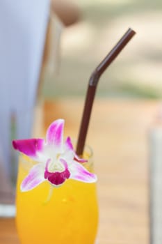 Glass of iced orange juice, stock photo