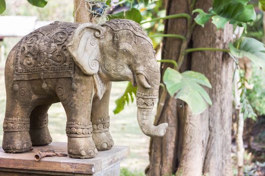 Elephant clay doll decorated in garden, stock photo
