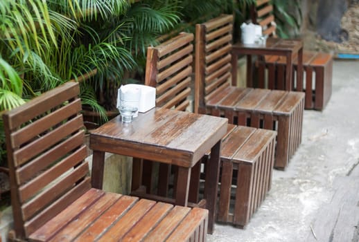 Wooden table decorated in restaurant, stock photo