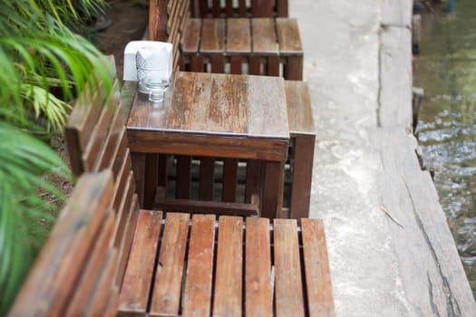 Wooden table decorated in restaurant, stock photo