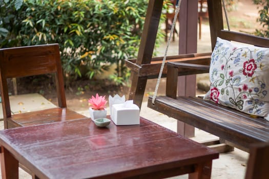 Wooden table decorated in restaurant, stock photo