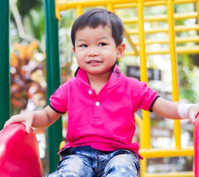 Asian boy relax in the park, stock photo