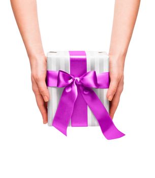 male holding gift box with a bow isolated on white background