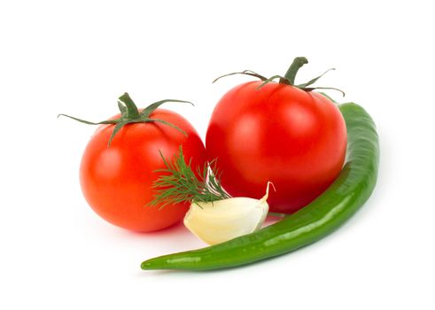 Chili pepper, garlic and tomatos isolated on white background