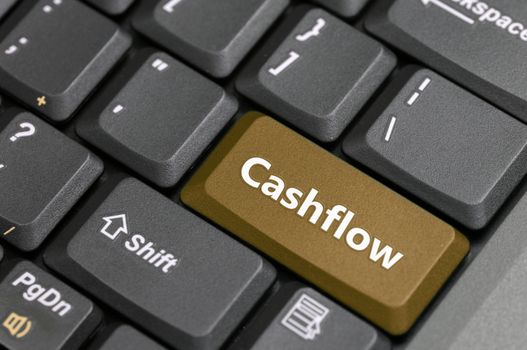 Brown cashflow key on keyboard