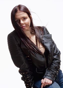 Portrait of a Young Woman in Leather Jacket - Isolated on Gray