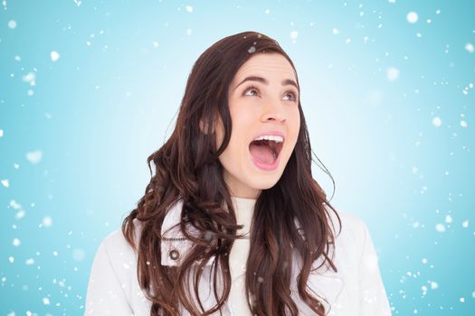 Beauty brown hair in white coat screaming against blue vignette