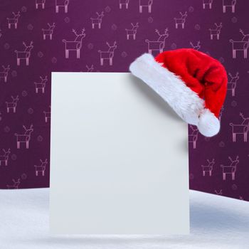 Santa hat on poster against purple reindeer pattern