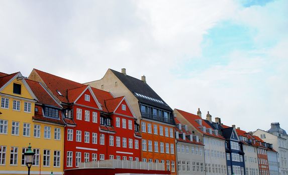 Famous Houses in Nyhavn Copenhagen, Denmark. In Red House in Foreground lived Hans Christian Andersen.