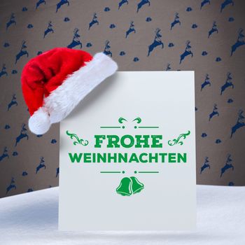 frohe weinhnachten against grey reindeer pattern