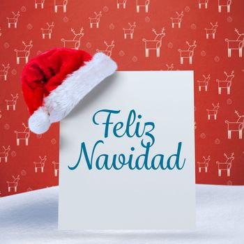 Feliz navidad against red reindeer pattern