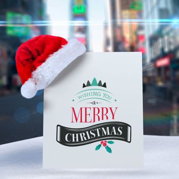 Christmas message against blurred new york street