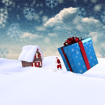 Santa delivering large gift against snowy landscape