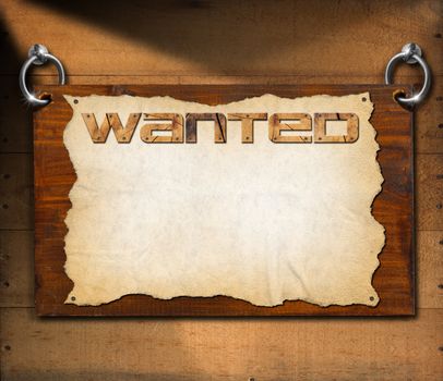 Dark wooden sign board with torn empty parchment with written wanted. Hanging on a wooden wall.