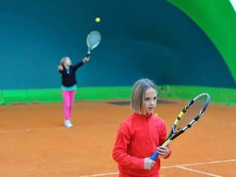 Children at school during a dribble of tennis