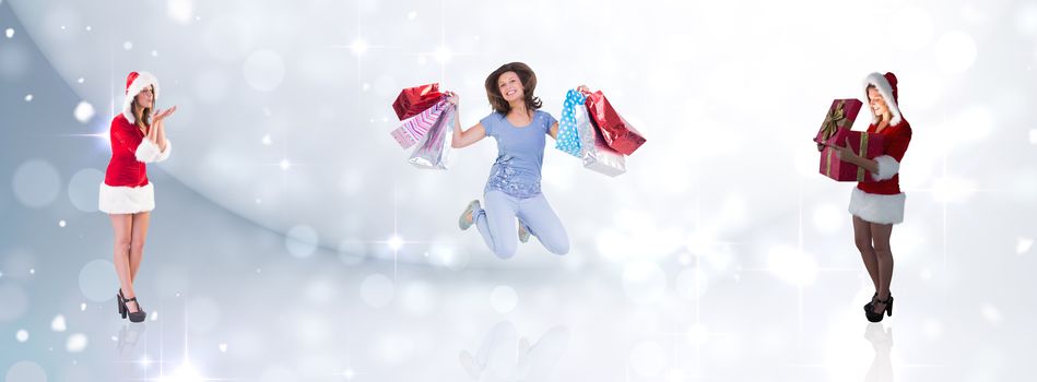 Santa girl opening gift against lights twinkling in room