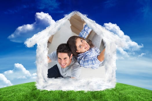 Overview of couple giving thumbs up against green field under blue sky