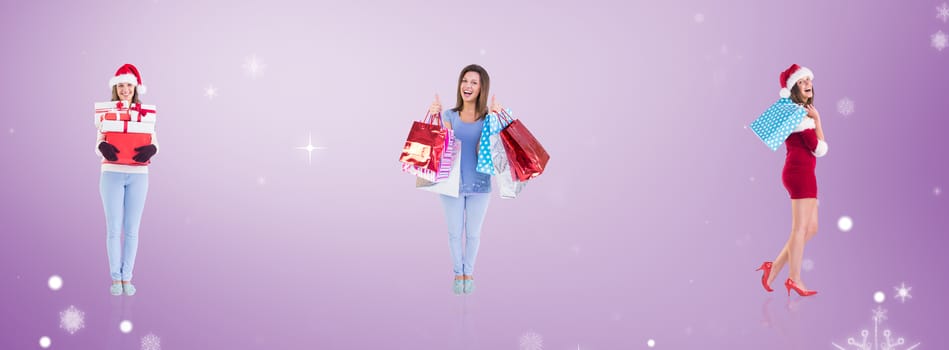 Festive brunette holding shopping bags against purple vignette