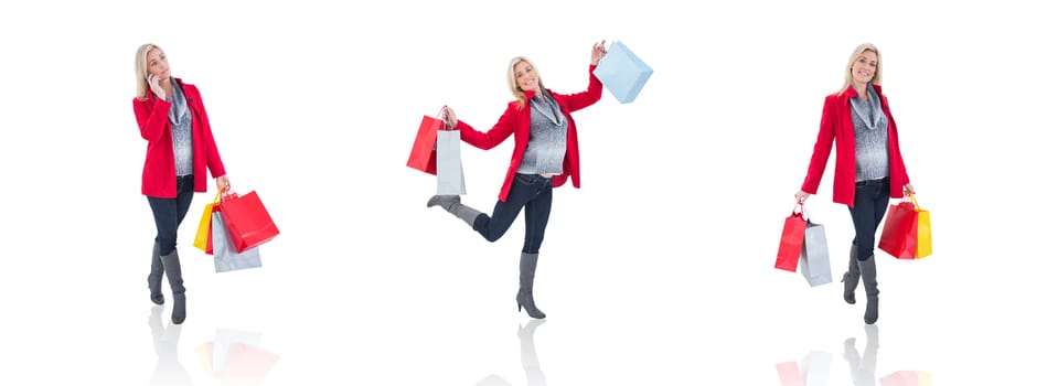 Composite image of happy blonde in winter clothes holding shopping bags