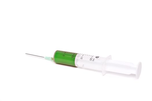 syringe with green medication isolated on white background