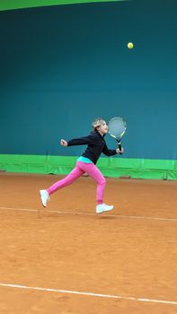 Children at school during a dribble of tennis