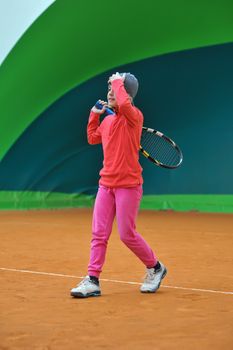 Children at school during a dribble of tennis