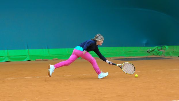 Children at school during a dribble of tennis