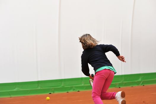 Children at school during a dribble of tennis