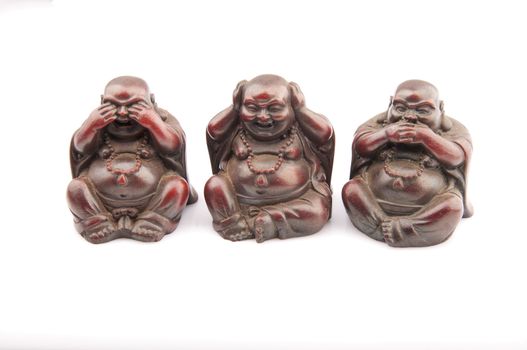 three Buddhas on white background