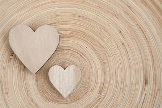 valentine's wooden hearts on a wooden background , valentine's day, day valentine postcard with space for text