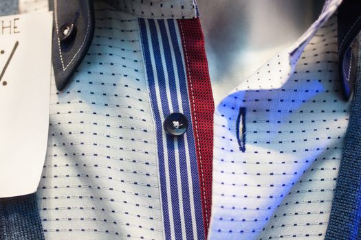 Close up of male shirts exposed in the clothes shop