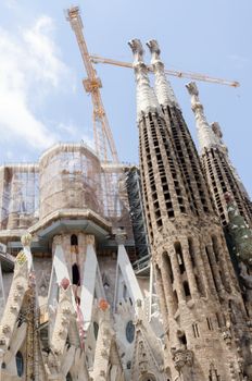 BARCELONA, SPAIN - JULY 13: View of the Sagrada Familia construction, a large Roman Catholic church in Barcelona, Spain, designed by Catalan architect Antoni Gaudi­, on July 13, 2012. Barcelona