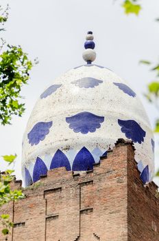 Architectural mosaic detail in shape of egg on building in Madrid Spain